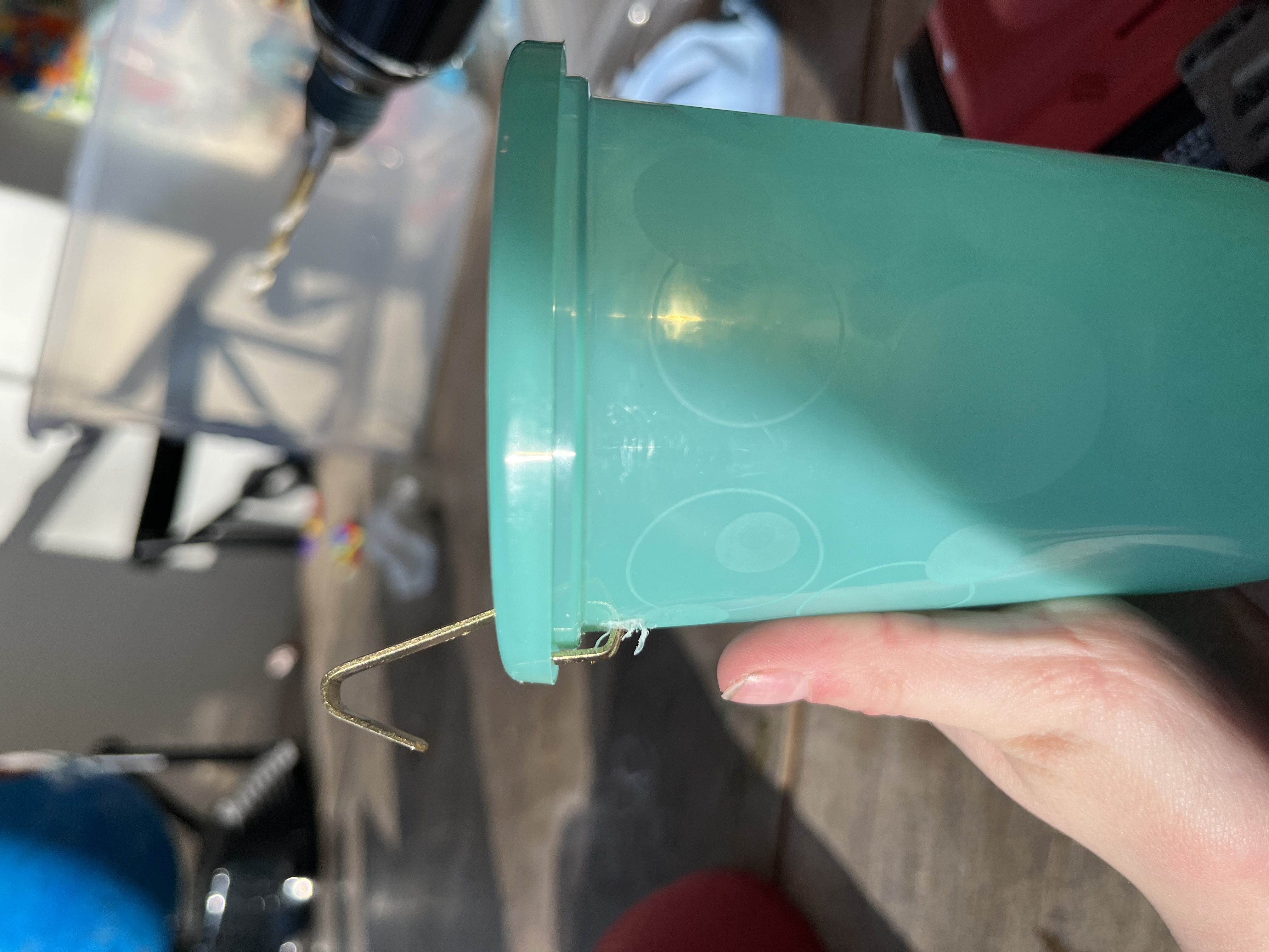 Dad bending the hook back into place