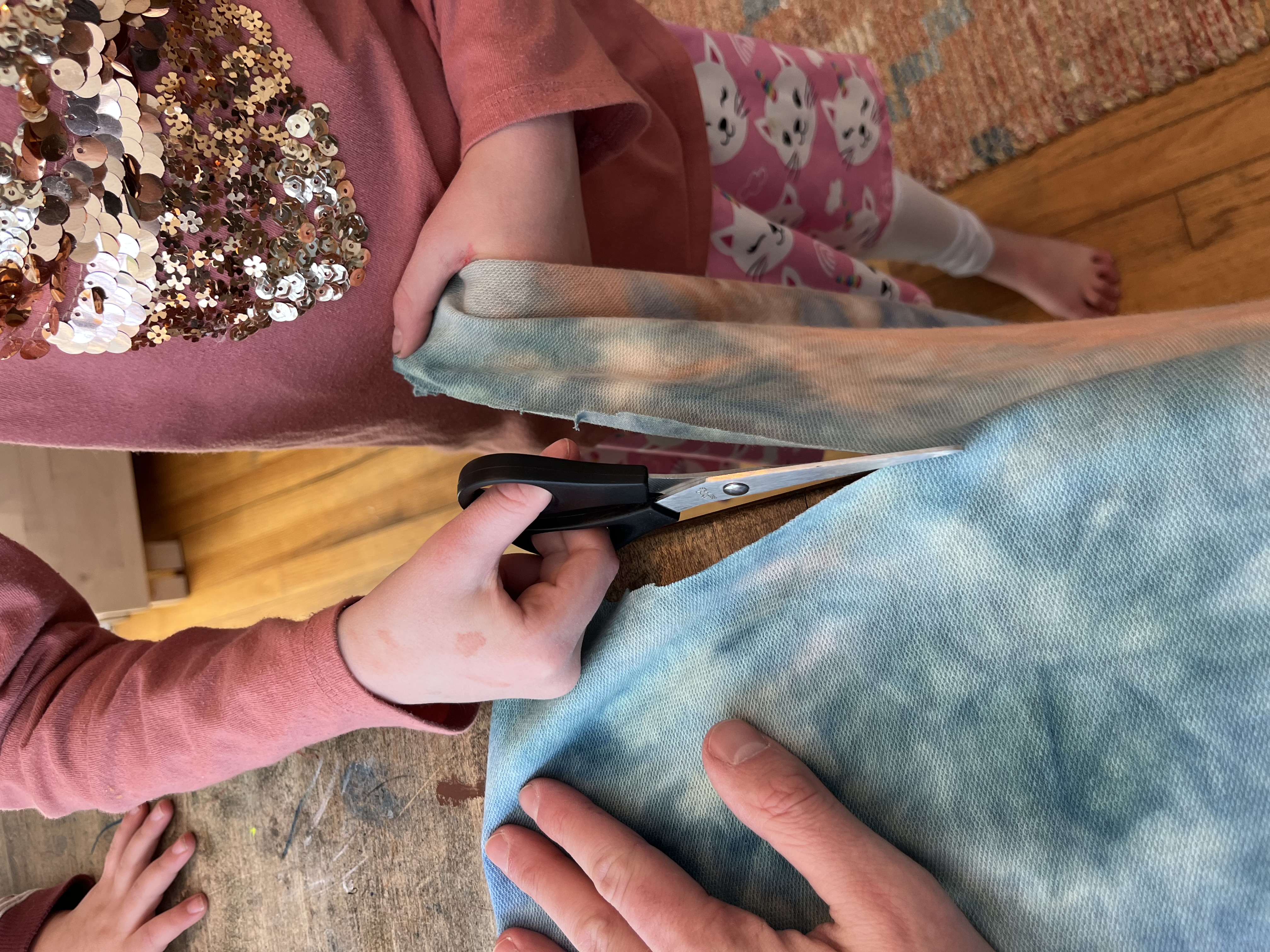 Cutting the fabric in half